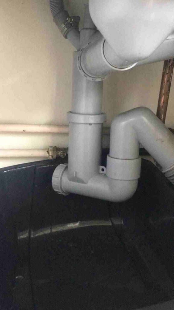 Pipes under kitchen sink